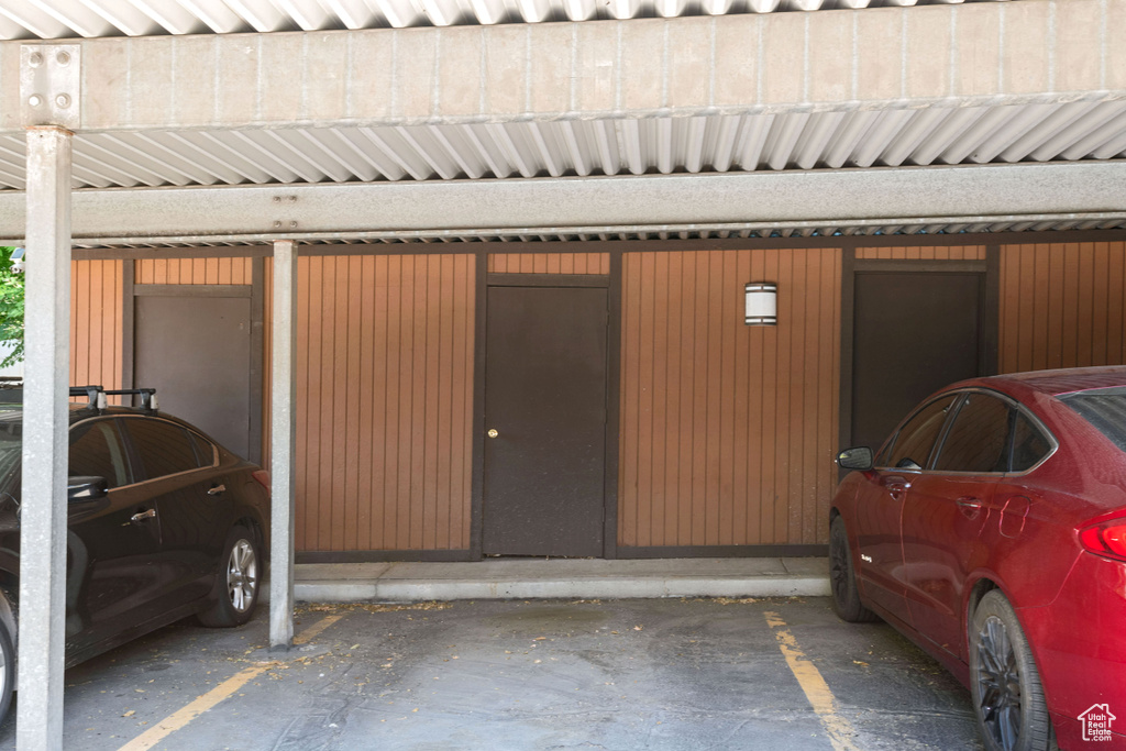 Garage featuring covered parking
