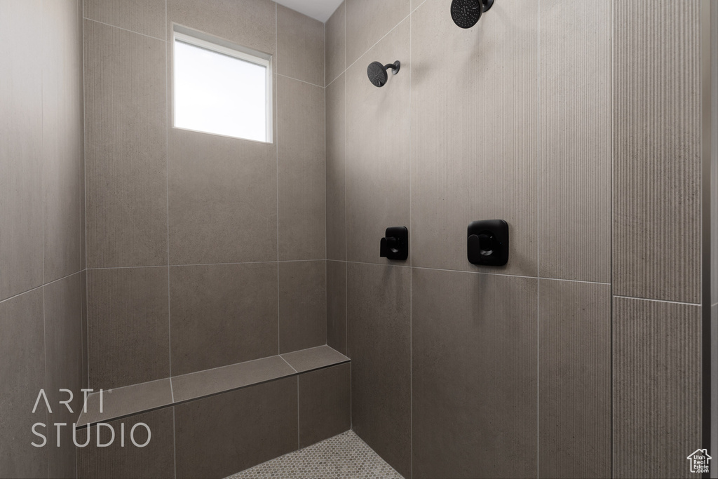 Bathroom with tiled shower