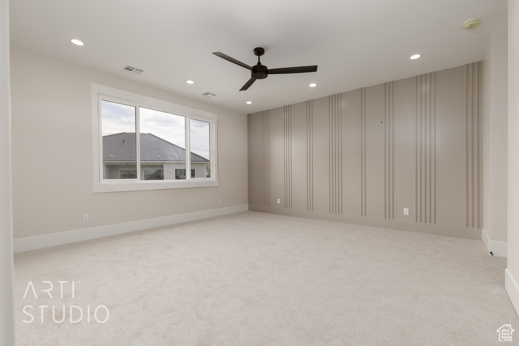 Empty room featuring ceiling fan, carpet flooring, recessed lighting, a smoke detector, and baseboards