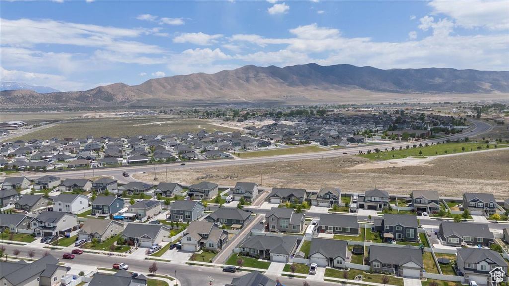 View of property location with nearby suburban area and a mountain backdrop