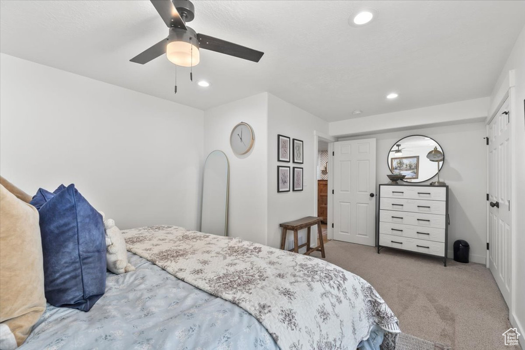 Bedroom with carpet flooring, recessed lighting, and ceiling fan