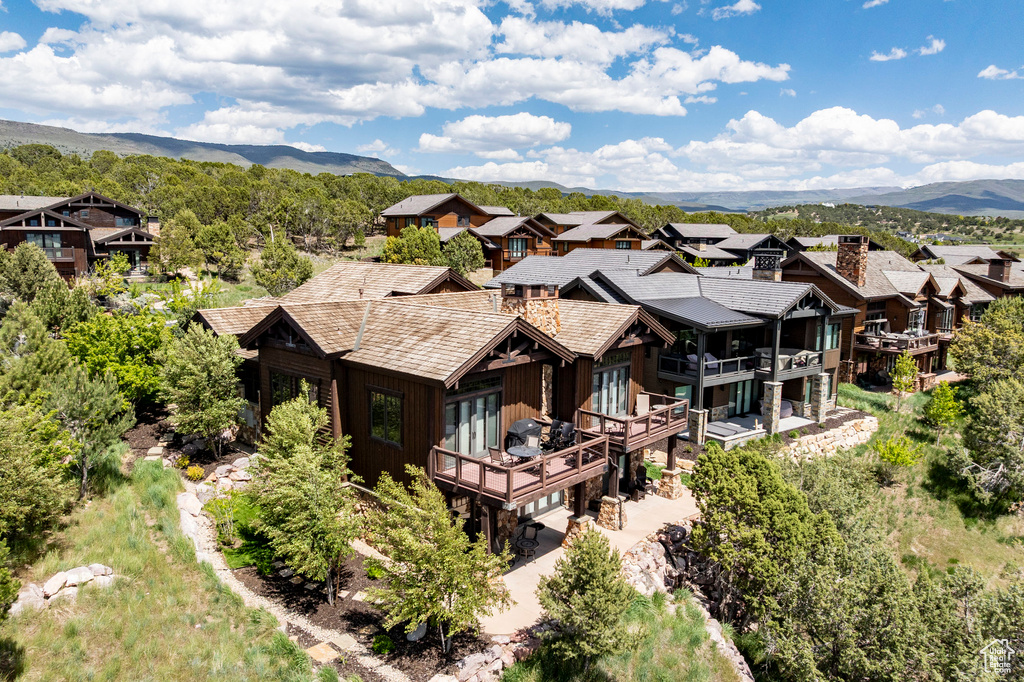 Aerial view of residential area with mountains