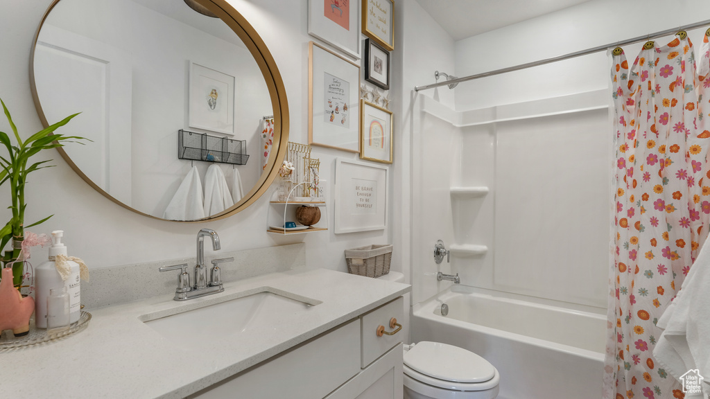 Full bathroom with vanity and shower / tub combo with curtain