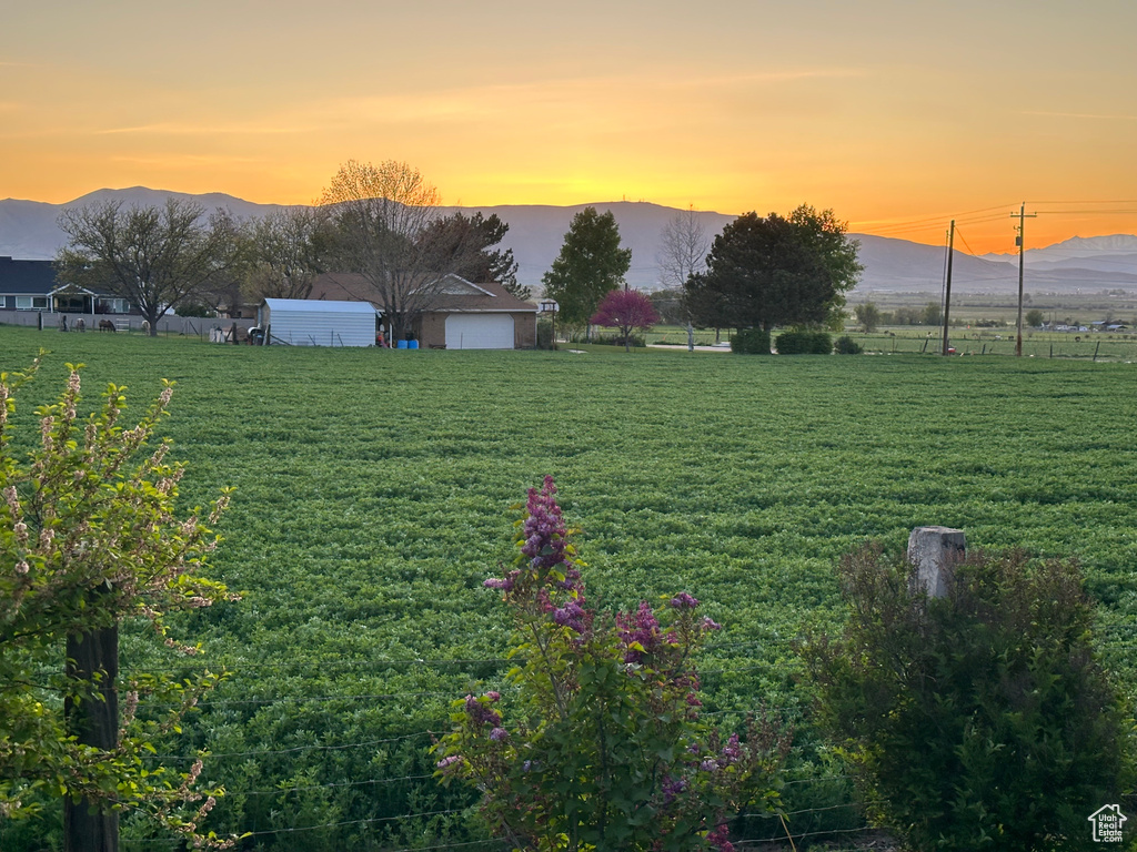 View of yard featuring a mountain view and a rural view
