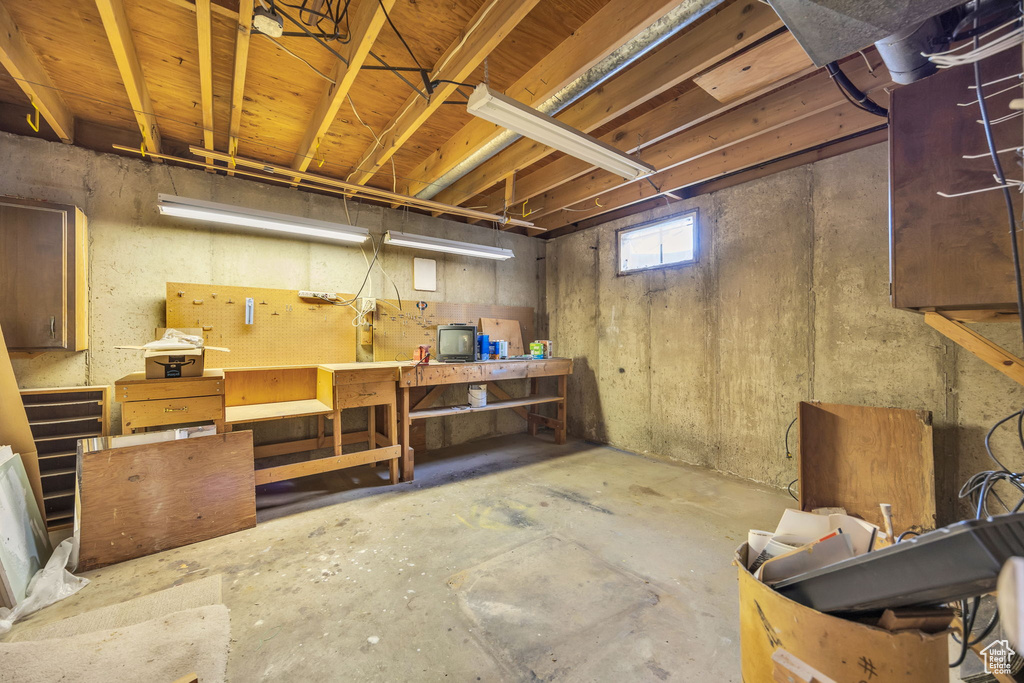 Basement featuring a workshop area