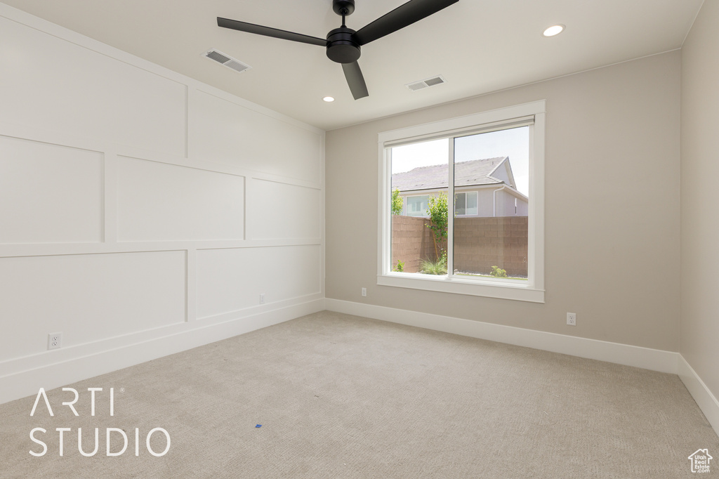 Unfurnished room with light carpet, ceiling fan, recessed lighting, and baseboards