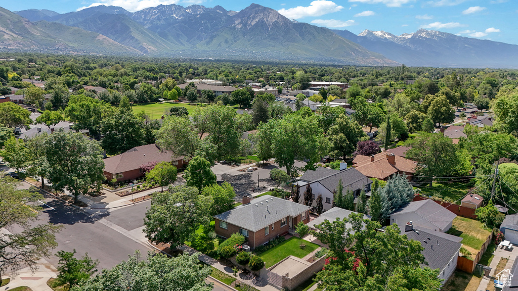 Aerial view of residential area with a mountain backdrop