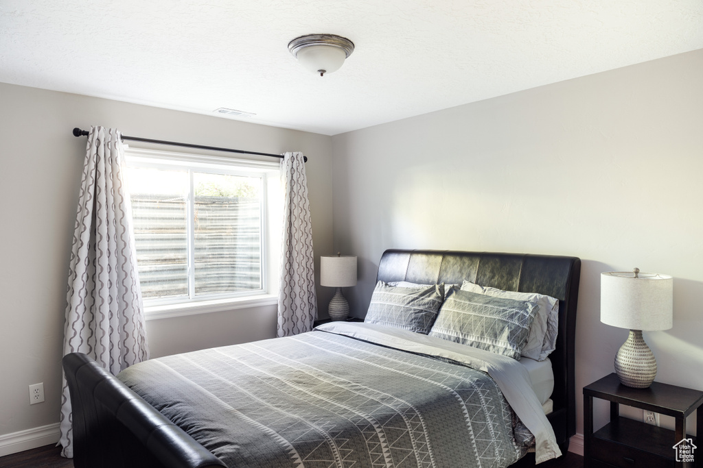 Bedroom featuring baseboards