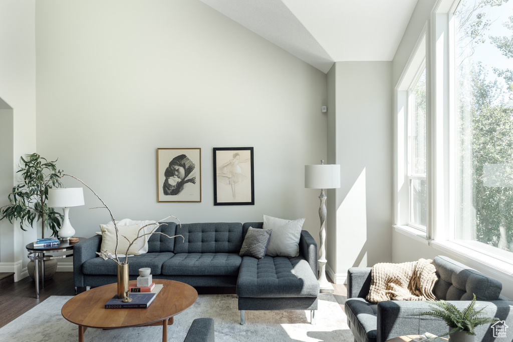 Living room with wood finished floors and baseboards