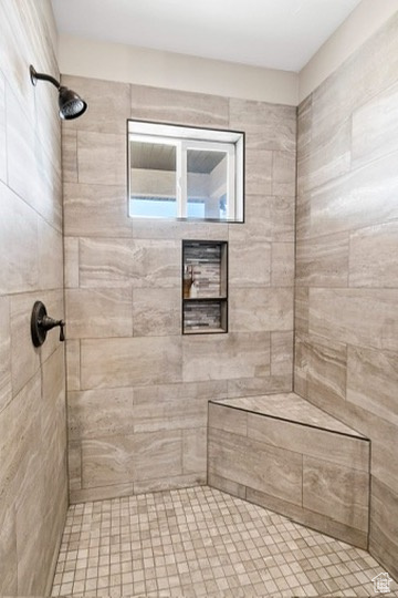 Bathroom with tiled shower