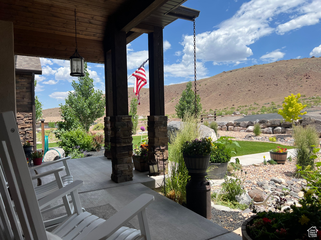 View of patio / terrace featuring a mountain view