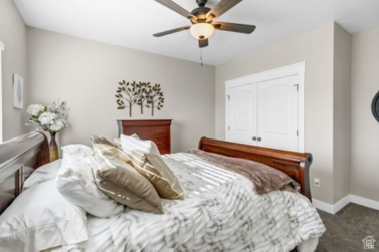 Bedroom featuring carpet floors, a closet, and a ceiling fan