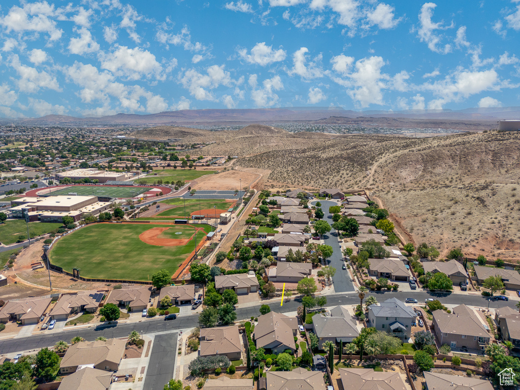 Aerial view of residential area with a mountain backdrop