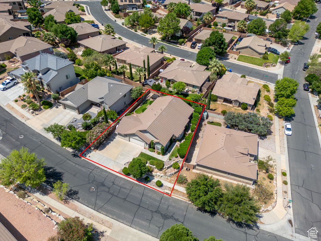 Aerial view of residential area with property parcel outlined