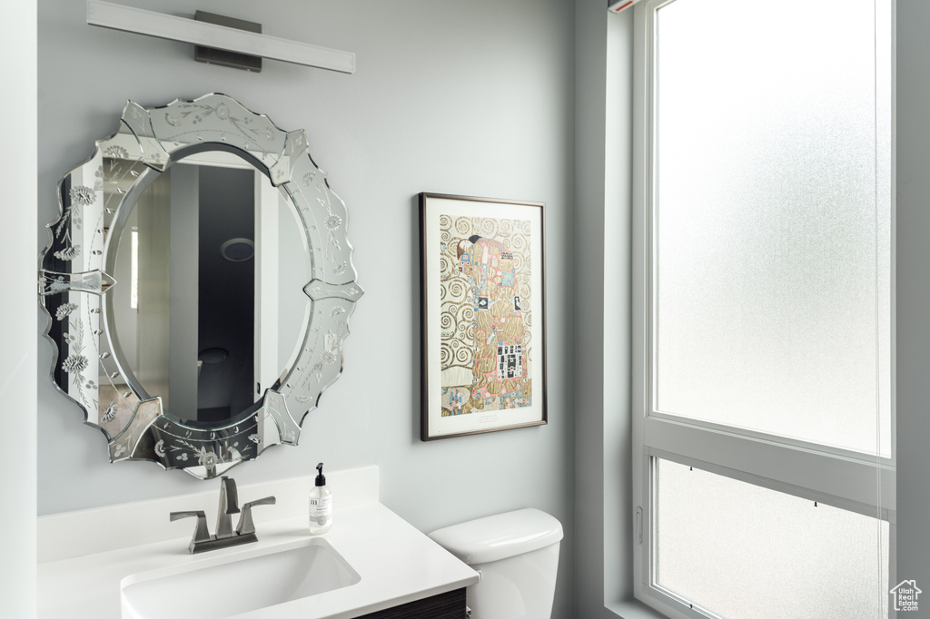 Bathroom featuring toilet and vanity