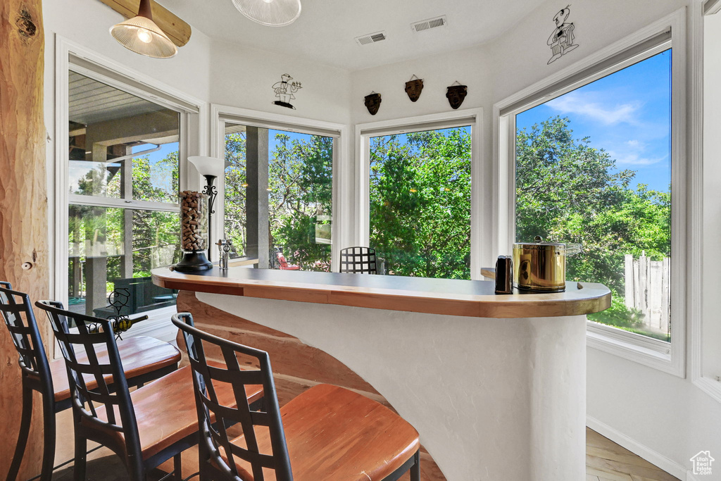 Sunroom featuring baseboards