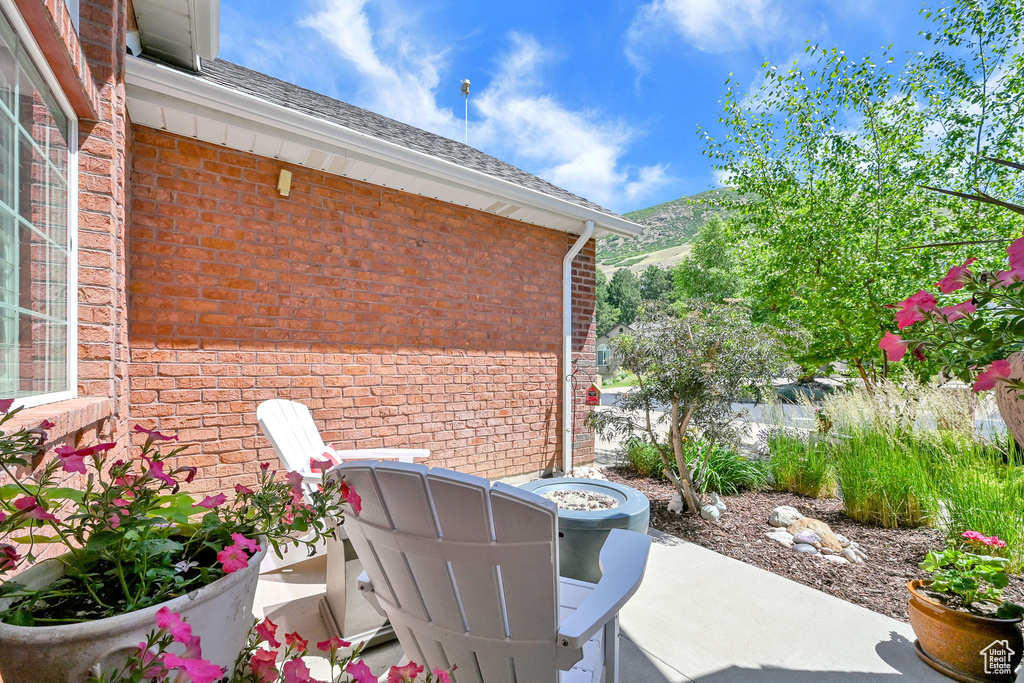View of patio / terrace with a mountain view