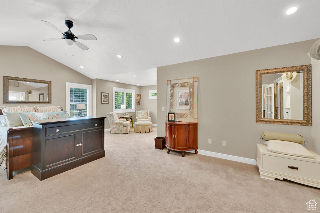 Bedroom featuring light colored carpet, recessed lighting, and vaulted ceiling