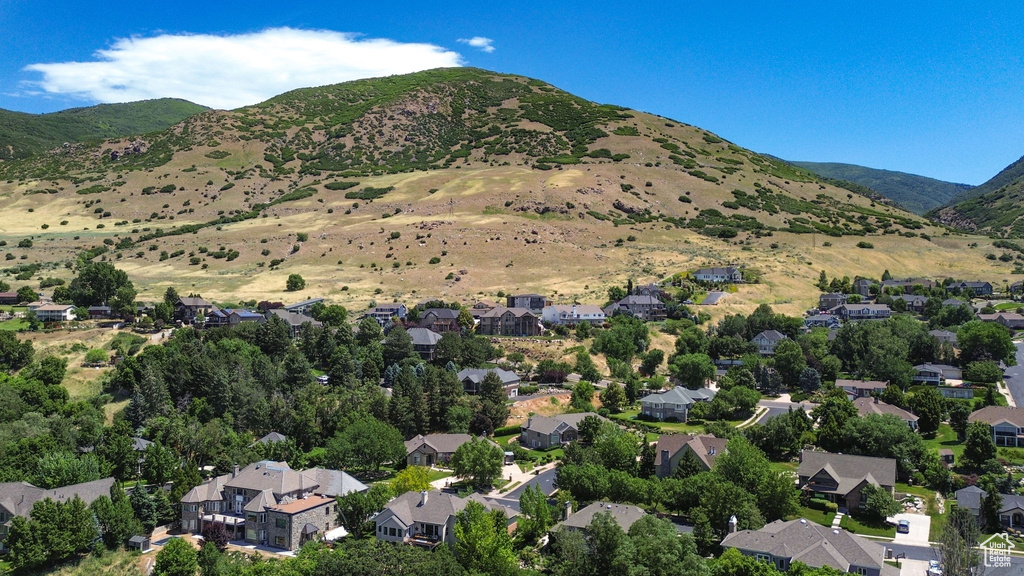Mountain view featuring nearby suburban area