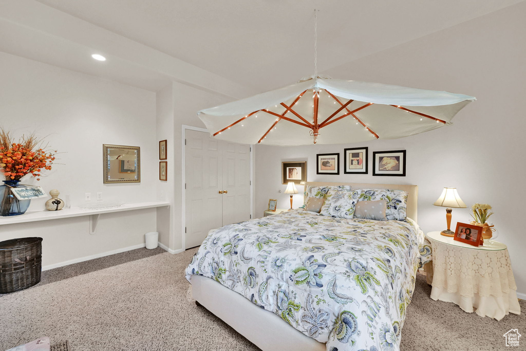 Carpeted bedroom featuring baseboards and recessed lighting