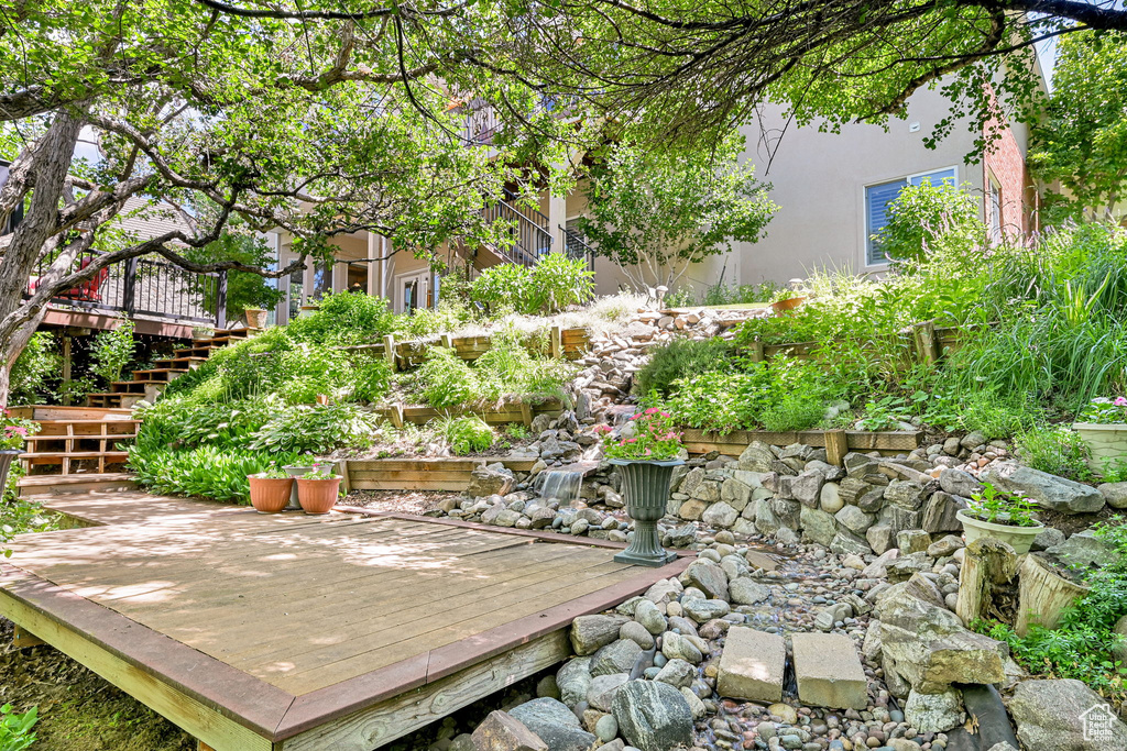 View of patio / terrace with stairway and a deck