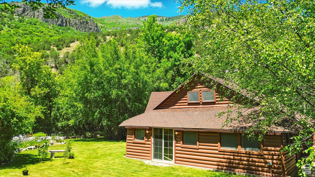 Mountain view featuring a forest