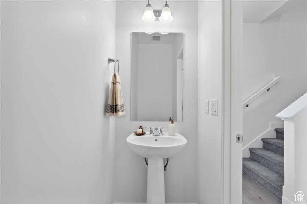 Bathroom with wood finished floors