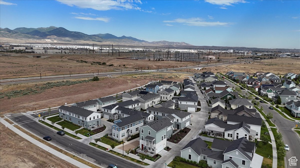 Aerial view of residential area with a mountain backdrop