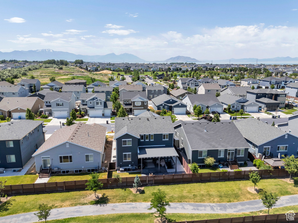 Aerial view of residential area with mountains