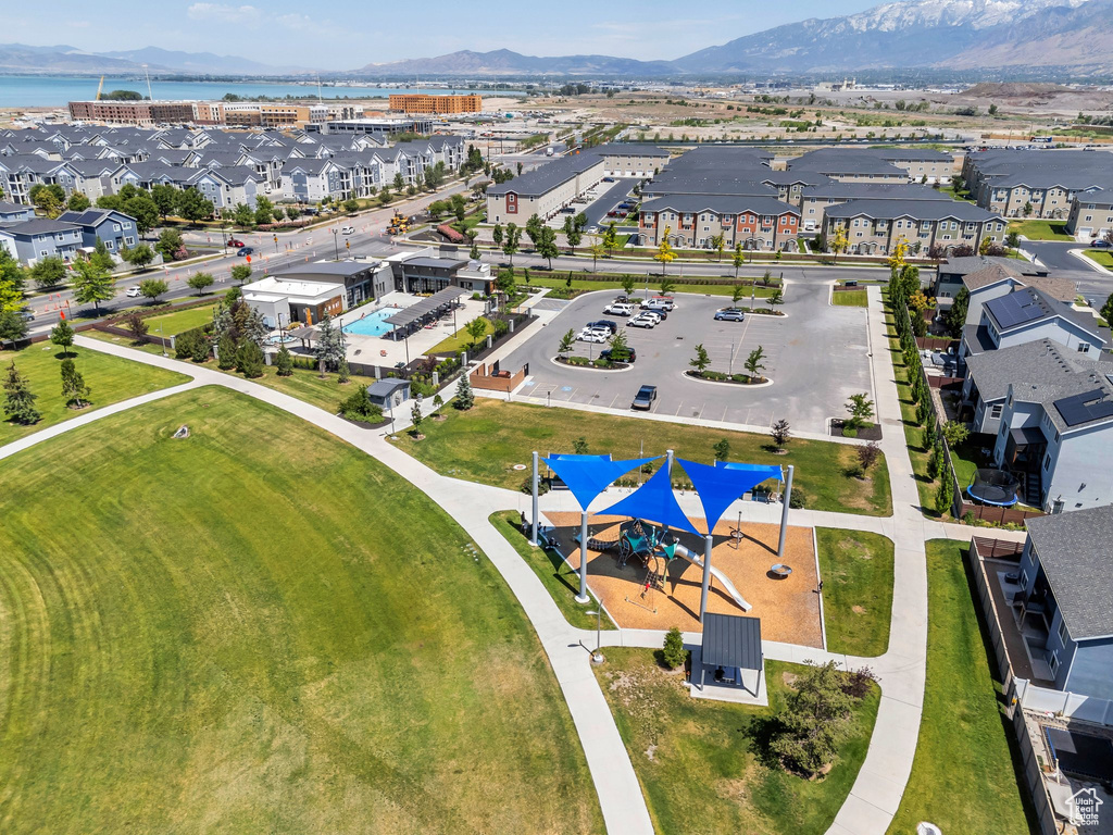 Aerial perspective of suburban area featuring a water and mountain view
