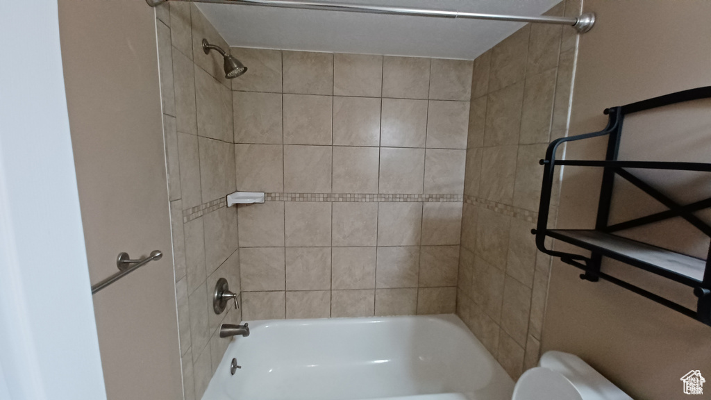 Full bath with toilet and  shower combination