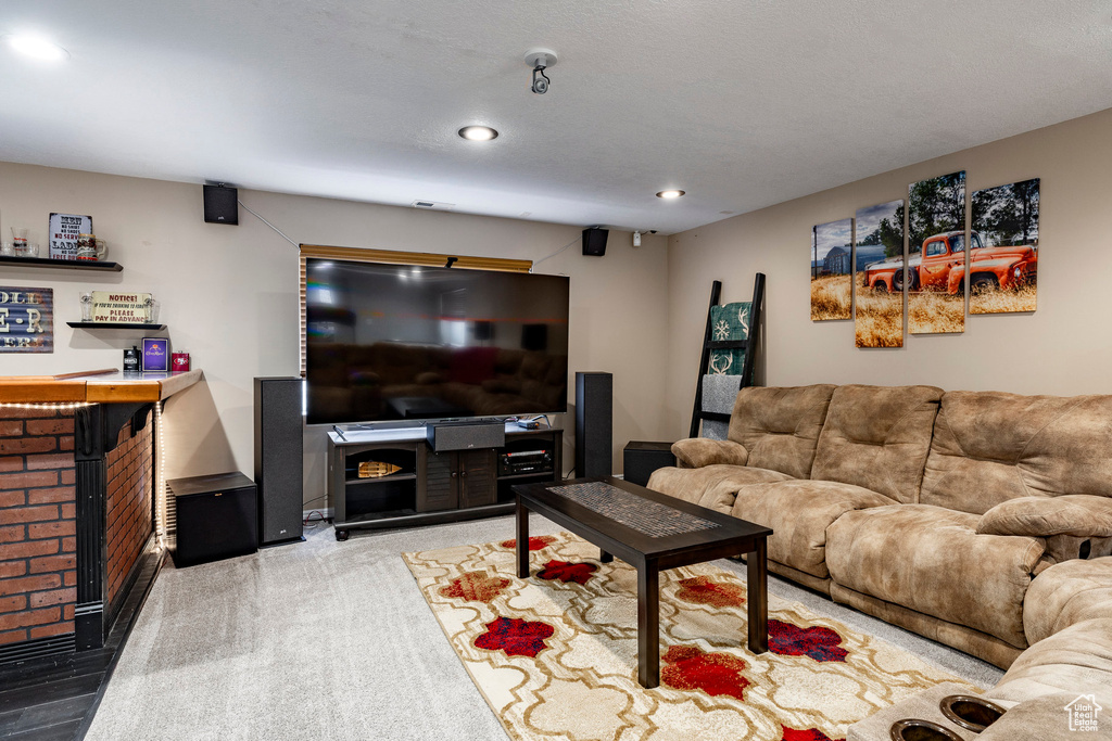 Living area featuring recessed lighting and a dry bar