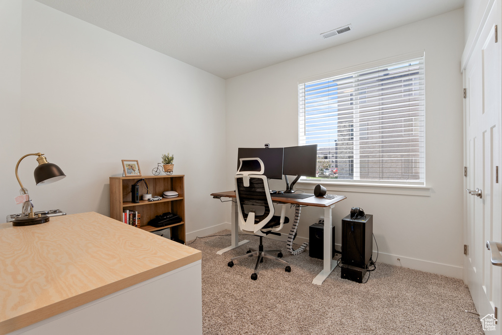 Office area featuring carpet floors