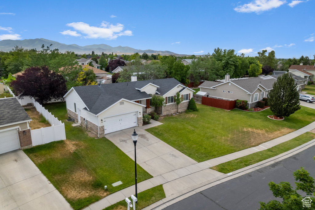 Aerial perspective of suburban area with mountains