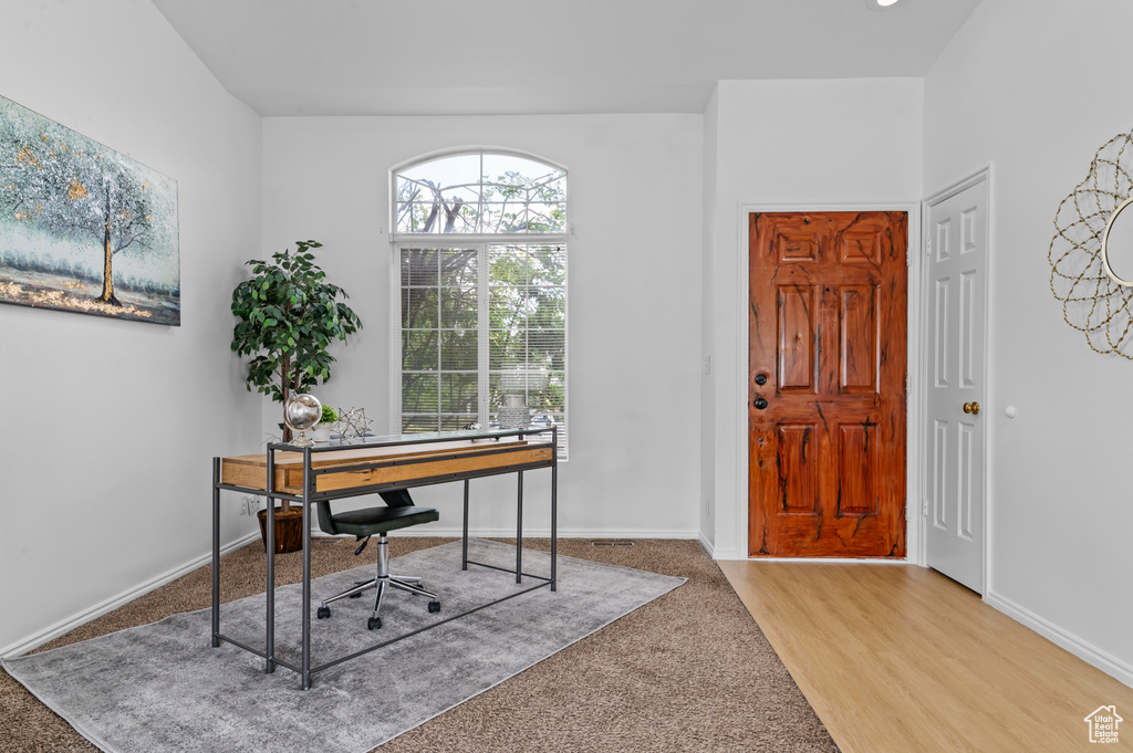 Office featuring carpet and baseboards