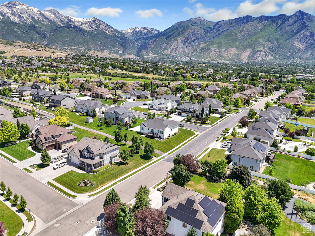 Aerial view of residential area featuring mountains