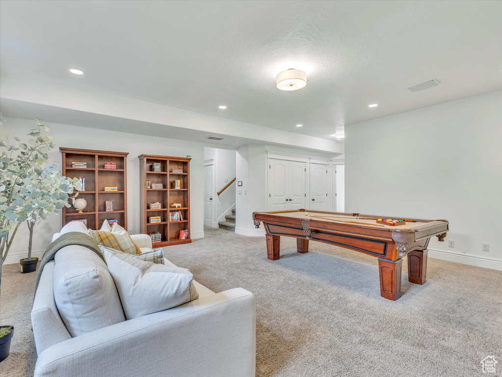 Rec room featuring light colored carpet, pool table, and recessed lighting