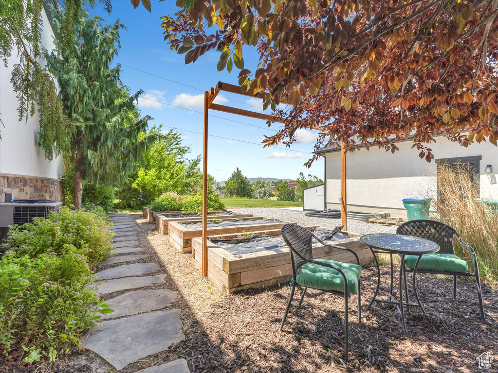 View of yard with a vegetable garden