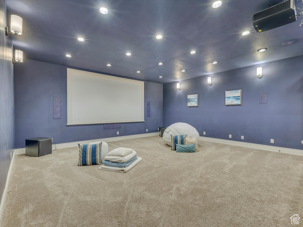 Carpeted cinema room featuring baseboards and recessed lighting