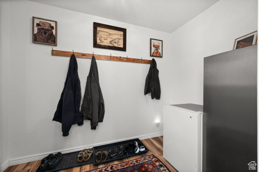 Mudroom with wood finished floors
