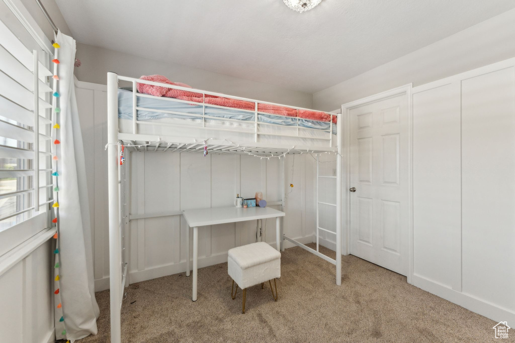 Bedroom featuring carpet flooring