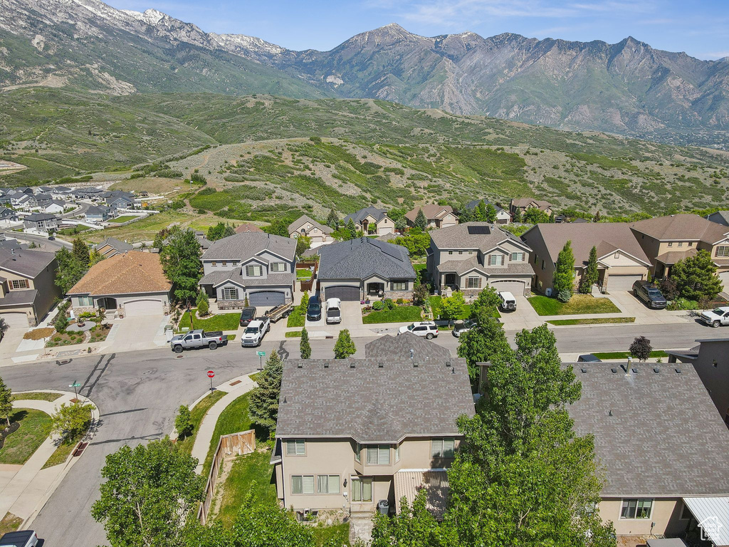 Aerial view of residential area with a mountain backdrop