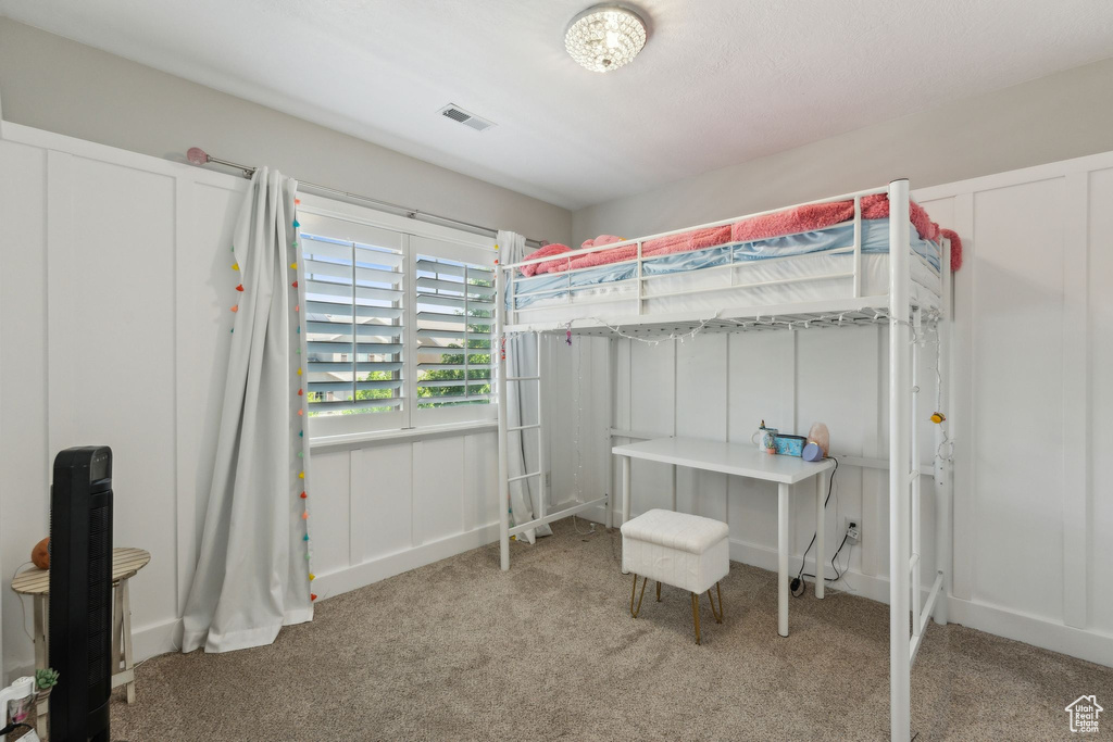 View of carpeted bedroom