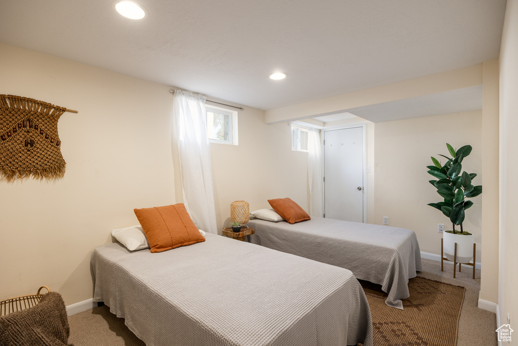 Bedroom with carpet floors and recessed lighting