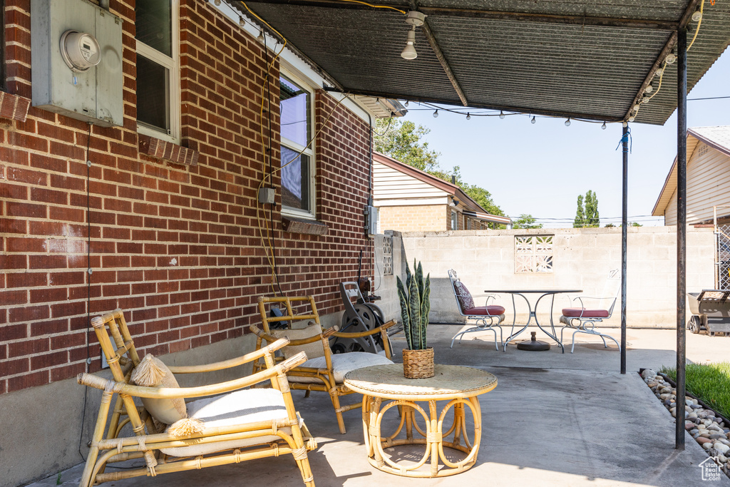 View of patio featuring outdoor dining area