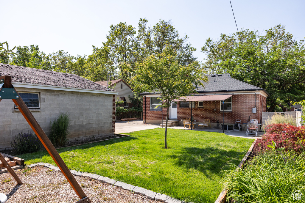 Back of property featuring a patio area and entry steps