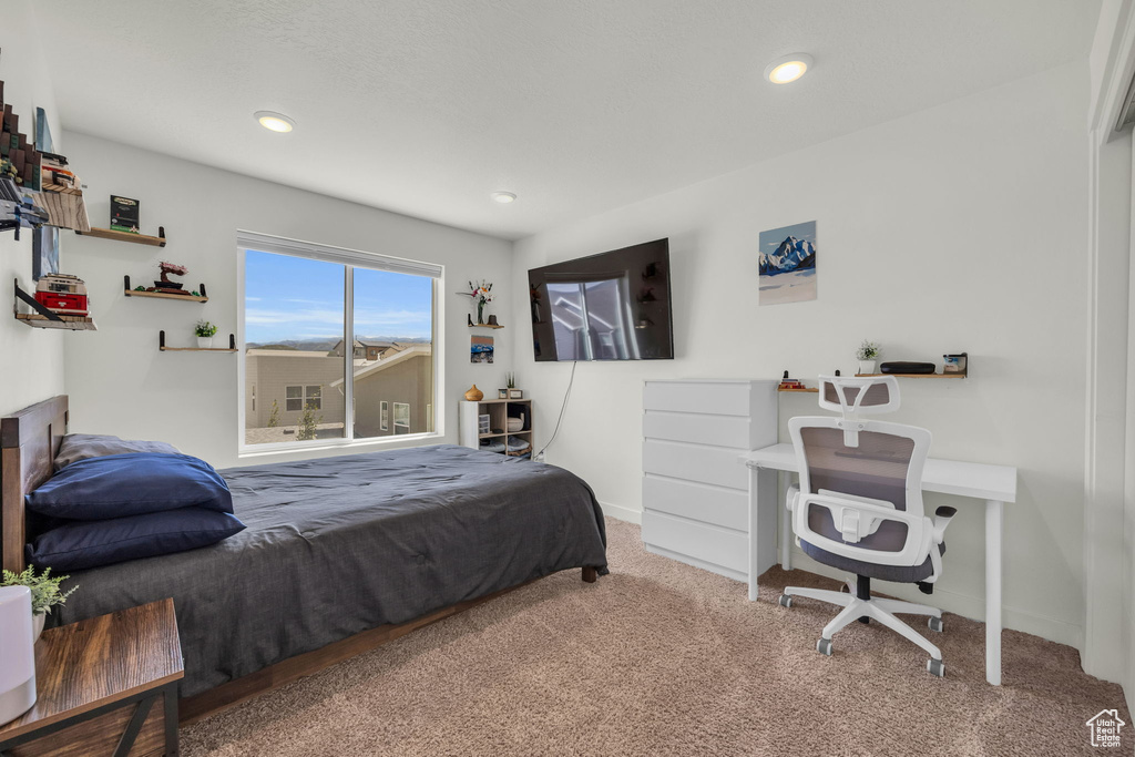 Bedroom featuring carpet floors and recessed lighting