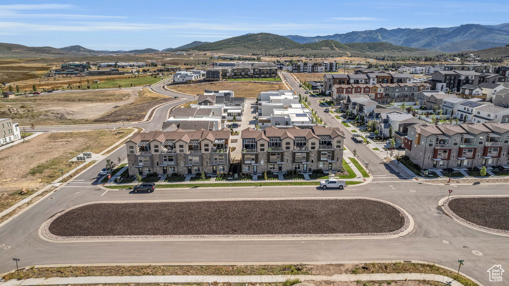Aerial perspective of suburban area with a mountain backdrop