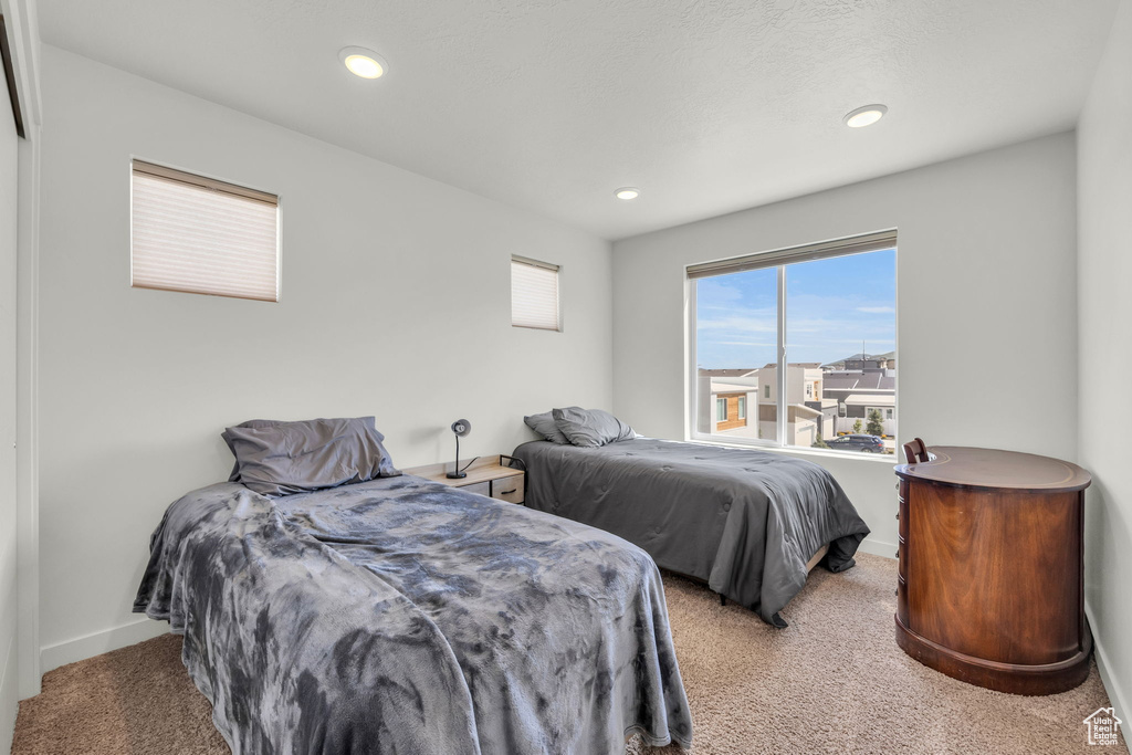 Bedroom featuring carpet and recessed lighting