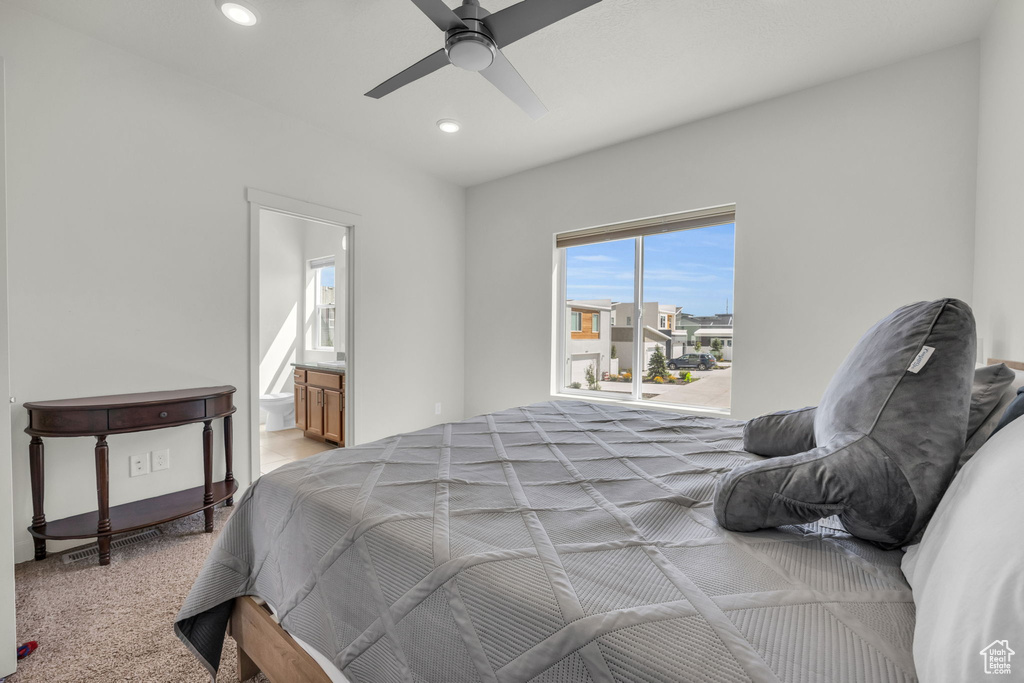 Bedroom featuring carpet, recessed lighting, connected bathroom, and a ceiling fan